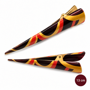 Hair clip in the shape of a snowflake with a colourful pattern